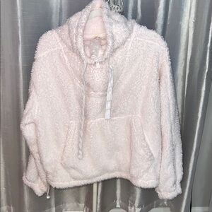 Free People Movement Big Sky faux shearling pullover in ballerina pink.